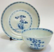 An 18thc Chinese Nanking Cargo blue and white porcelain cup and saucer with pine tree decoration (