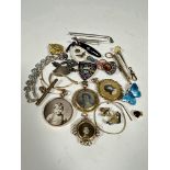 A collection of vintage jewellery including a 9ct gold doubled sided portrait locket with knot