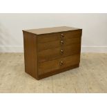 A mid century teak chest fitted with four drawers H67cm, W85cm, D43cm