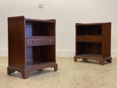 A pair of mahogany bedside tables in the Georgian taste, three quarter galleried top over open shelf