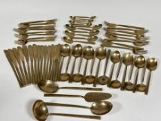 A large suite of 1960/70's bronze flatware, comprising fifteen desert spoons, various sizes, six