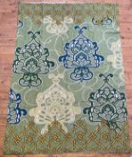 A Kashmiri hand chain stitched wool panel with floral motifs on a green field 175cm x 122cm
