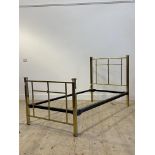 An early 20th century gilt brass and iron single bed frame H110cm, W94cm, L202cm