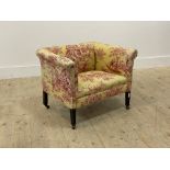 A late Victorian bedroom chair, well upholstered in toile de jouy fabric, raised on square tapered