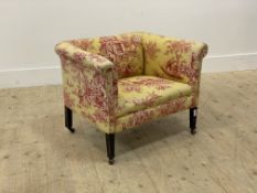 A late Victorian bedroom chair, well upholstered in toile de jouy fabric, raised on square tapered