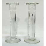 A pair of Lindean Mills fluted column glass candle stick holders (each signed verso) (h- 21cm)