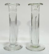 A pair of Lindean Mills fluted column glass candle stick holders (each signed verso) (h- 21cm)