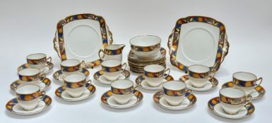 A Standard China art nouveau pattern tea service comprising twelve tea cups, twelve saucers, a