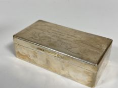 A London silver presentation rectangular cigarette box, the top with engraved inscription to