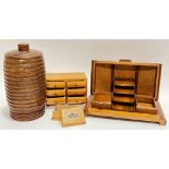 A group of wooden objects comprising a small Mauchlin ware matchbox holder/stamp box depicting 'St