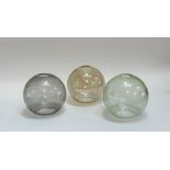 A trio of crackled glass oval shades one light green, light black and light yellow. (w-18cm h-