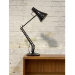 A mid century Anglepoise lamp, finished in black lacquer