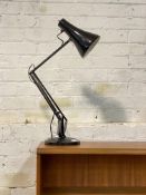 A mid century Anglepoise lamp, finished in black lacquer