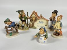 A group of six German Hummel pottery figures including, Fascination, Serenade, etc,. (Tallest H x