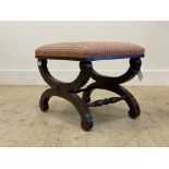 A Regency style mahogany foot stool with upholstered top raised on crossed supports H40cm, W51cm,