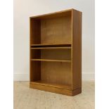 A mid century teak open bookcase, fitted with three adjustable shelves, H107cm, W76cm, D23cm