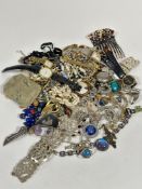 A large collection of vintage costume jewellery including paste pearls, gilt metal chains, paste set