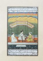 An Indo Persian school late 19thc?, three figures in a pavilion gouache embellished with two