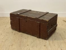 A late 19th / early 20th century metal bound stained pine steamer trunk, bearing old paper labels.