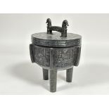 A Chinese cast metal bronze style Ting ritualistic censor and cover ice bucket with archaic style