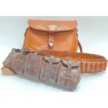 A WWII leather military ammunition belt, together with a leather military style bag and another