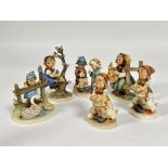 A collection of six German Hummel pottery figures including, Be Patient, Feathered Friends, Little