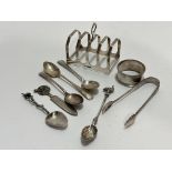 A Sheffield silver breakfast four division toast rack of squared shaped form, (H x7.5cm), two