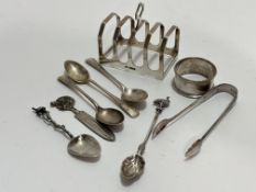 A Sheffield silver breakfast four division toast rack of squared shaped form, (H x7.5cm), two
