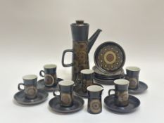 A 1960's Denby stoneware Arabesque pattern part coffee service comprising a six coffee cups(h-9.