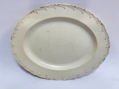 A large Georgian Creamware oval platter/ashet with moulded feathered decoration to rim (w- 41cm)