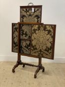 A mid 19th century mahogany metamorphic firescreen, three sliding embroidered silk lined panels,