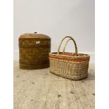 A woven reeded lidded basket of oval outline, together with two small wicker baskets (3)