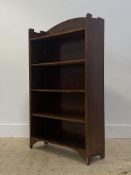 A stained oak and walnut floor standing open bookcase, first half of the 20th century, fitted with