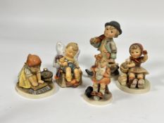 A group of five German Hummel pottery figures including, Mothers Helper, Big House cleaning, Just