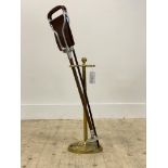 An Early 20th century cast brass stick stand (H55cm) together with a Royal marines swagger stick