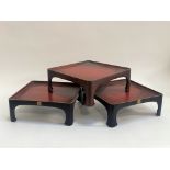 A trio of red lacquered square stands/trays two with gilt stamp to face. (h-12cm w-31cm) (damage