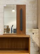 A mid century teak framed wall mirror with clothes brush H50cm, W38cm