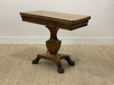 A late Regecny mahoganyt card table, the fold over revolving top opening to a baize lined playing