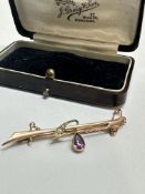 A Edwardian 9ct gold bar brooch, with pear shaped Amethyst and seed pearls compete with safety