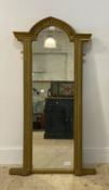 A 19th century and later (overpainted) gilt framed wall hanging mirror of Gothic design, 129cm x