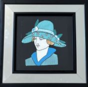 An Art Deco mirror with a textile study of a 1930's woman to centre (37.5cmx37.5cm)