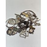 A collection of white metal and silver jewellery including a heavy metal ball pattern ball