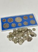 A pre decimal 1953 Queen Elizabeth II uncirculated set of coins and a collection of silver three