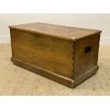 A Victorian pine blanket box, the top inset with tiles decorated in the Arts and Crafts style,