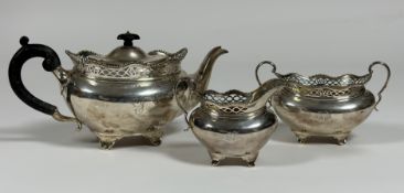 A George V Scottish silver three piece tea service, Hamilton & Inches, Edinburgh 1911, each piece of