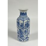 A Chinese blue and white porcelain rouleau vase, probably 19th century, the neck painted with a