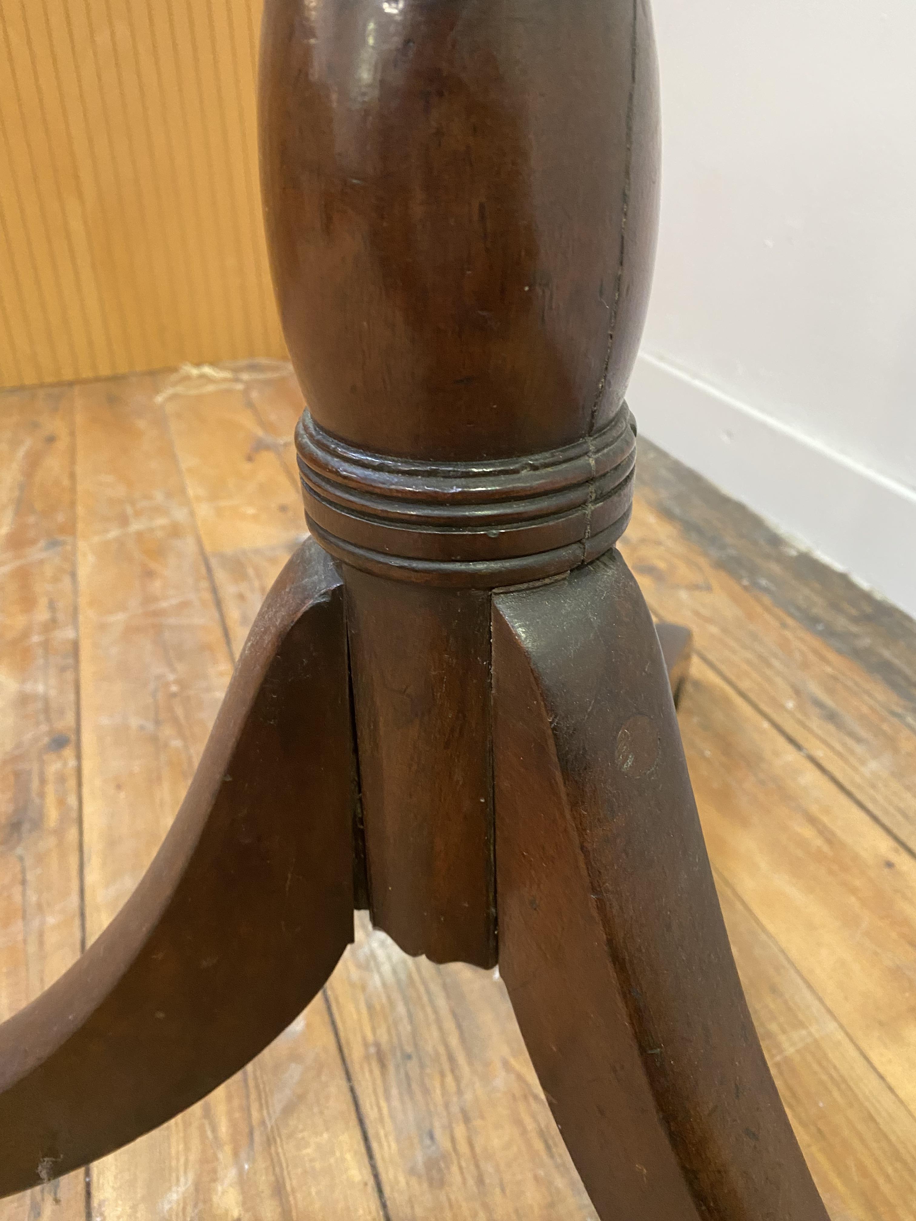 A 19th century mahogany hall stand, the ring turned column issuing six coat hooks, all standing on - Image 3 of 3