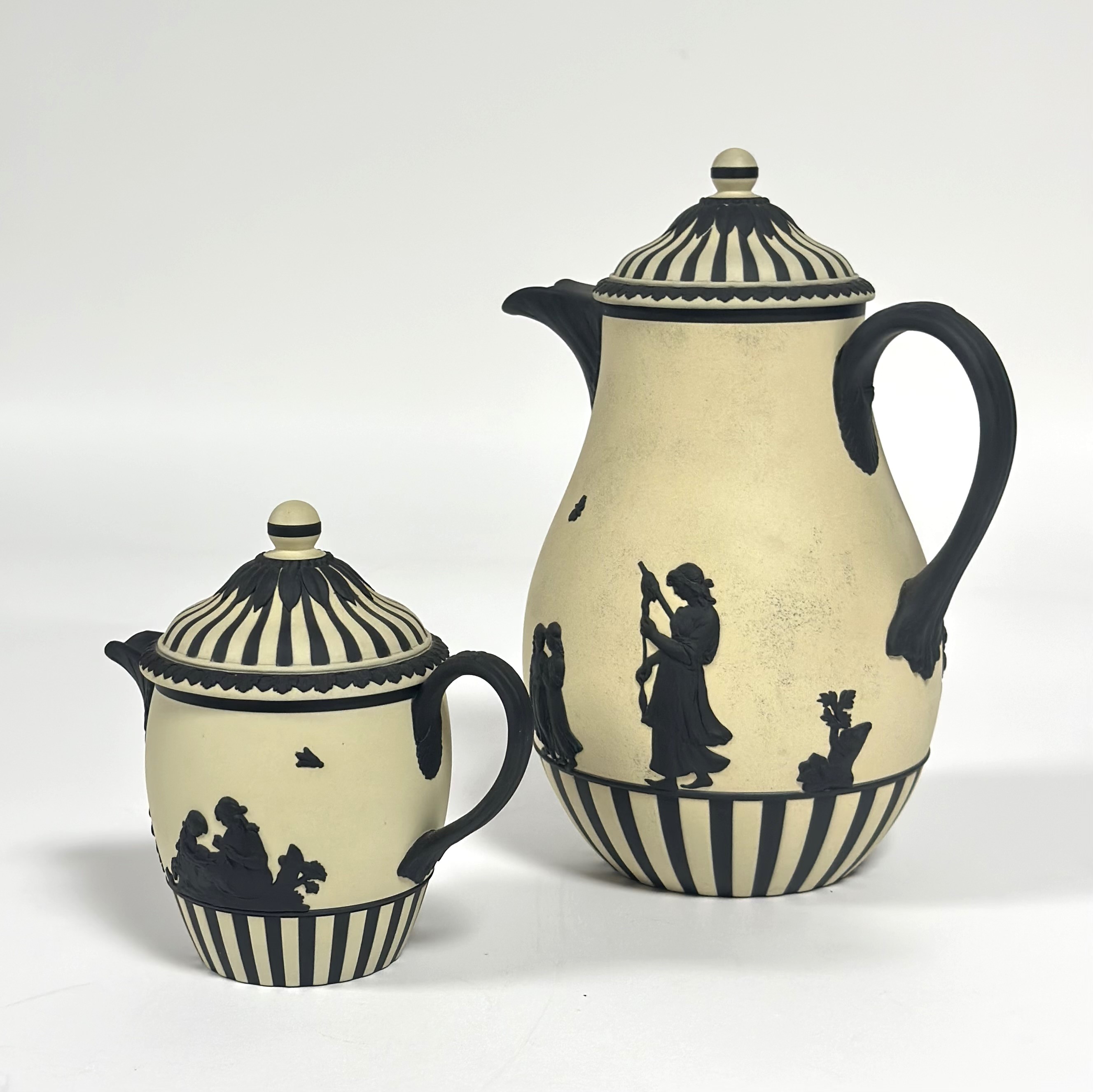 A rare 20th century Wedgwood yellow and black jasperware coffee pot, of baluster form, sprigged with