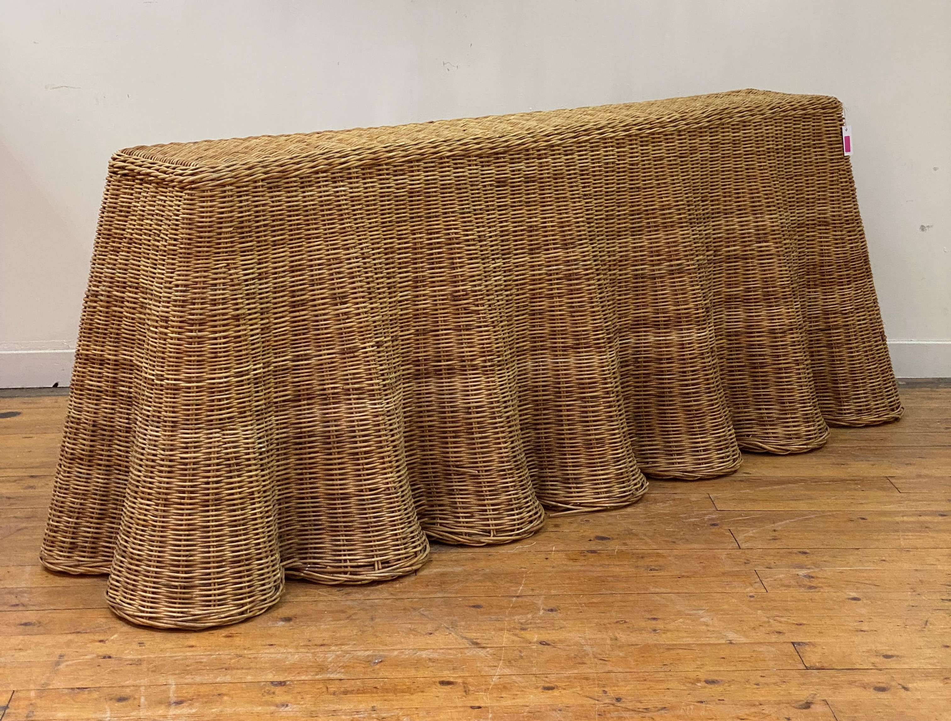 A contemporary ripple rattan console table, in the manner of Soane, the rectangular top over