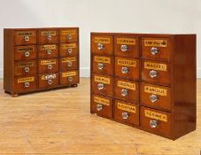 A pair of walnut apothecary or chemists' drawers, late 19th century, each fitted with twelve drawers